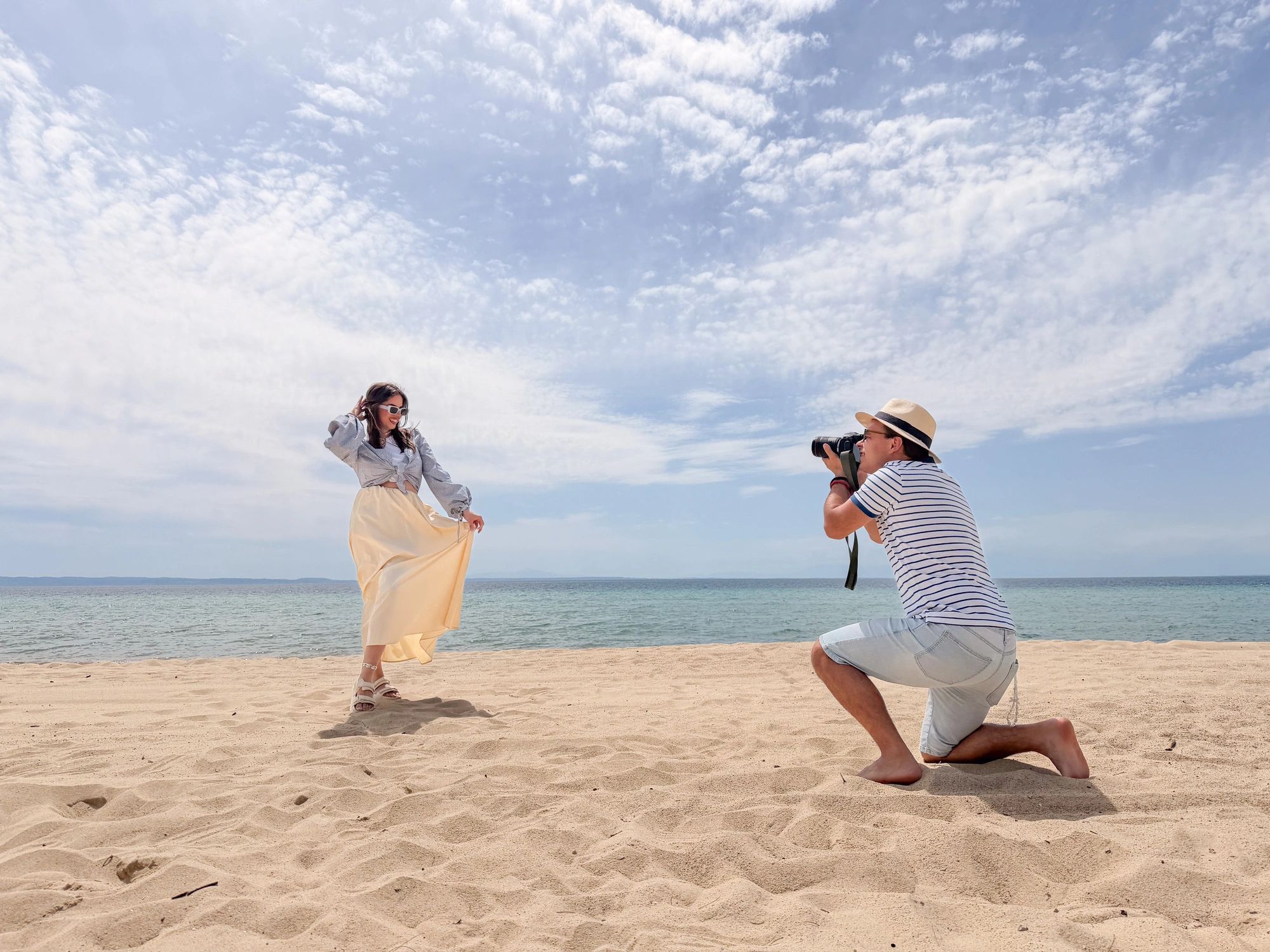 Photographer leading a portrait session outdoors